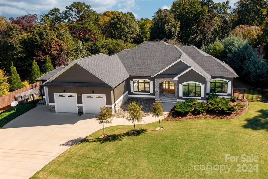 This modern 4-bedroom, 2.5-bathroom home with 3,200 square feet combines luxurious living with versatile outdoor potential. The property features a bright, open-concept layout with a modern kitchen equipped with high-end appliances, custom cabinetry, and a large island, perfect for hosting. The primary suite and main living areas each open to a spacious screened-in porch, offering a serene space for relaxation and entertaining. This beautiful home is being sold partially furnished, offering added convenience and value.

A standout feature of this property is its private backyard space, providing an excellent area to add a pool, creating your own private oasis. The landscaped grounds offer flexibility for further customization, perfect for those looking to elevate their outdoor experience.

While not directly lakefront, the home is conveniently located near Lake Norman's amenities and Cornelius’s vibrant shopping, dining, and recreational options.