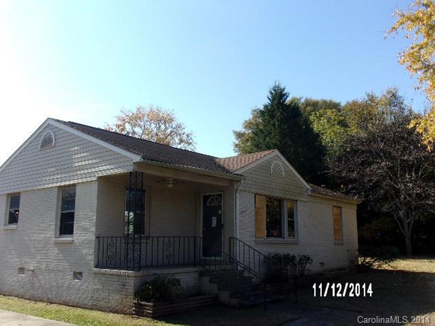 Ranch style home with large, flat yard and detached two car garage/workshop.  Fantastic location, close to shopping and I-77. Cash offers only. Home being sold “as-is, where-is.”