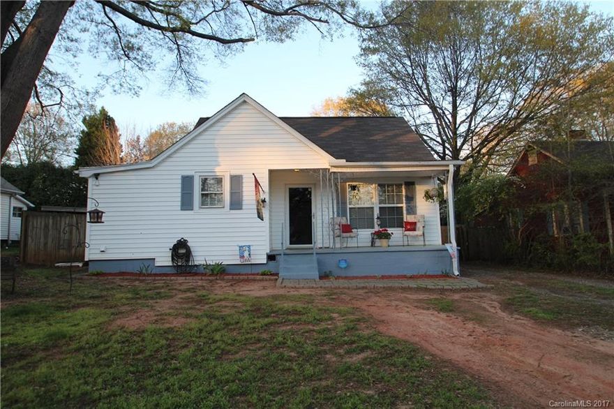 Well maintained Bungalow close to town & easy access to Hwy 74. This home will not disappoint. Home has been updated & features a spacious eat-in kitchen. Rocking chair front porch & patio in back w/ pond. Bkyrd is fenced in. Fully wired storage building. New SS Refrigerator stays. Laundry room. Upstairs bedroom/bath - furniture stays. Patio and Bkyard are very private. New HVAC 2014.