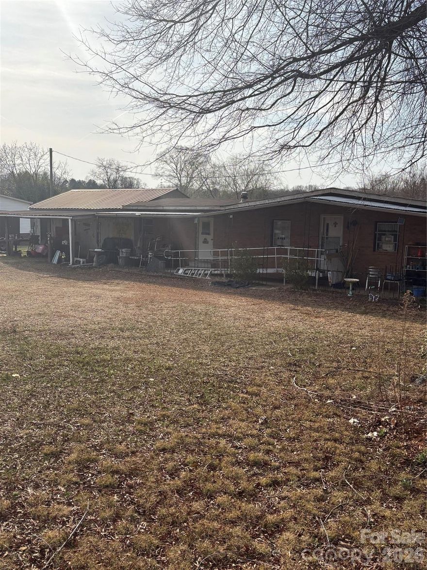 This is an older mobile home located in Rowan County on approximately .68 acres.   The property is in a distressed condition and in need of a lot of repairs.  The house is located on a well traveled road and is just a short distance from schools and shopping in the town of China Grove.  This would be a great home for an investor to refurbish.