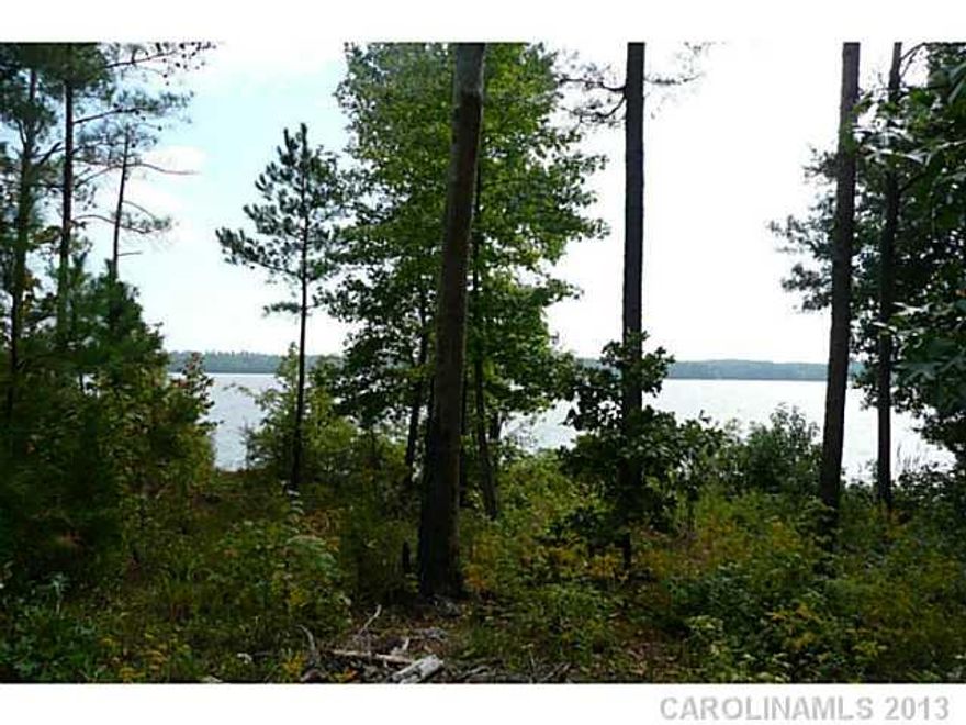 Great water view lot, located looking over Lakeshore dr with view of Fishing Creek lake.. Access to all Edgewater has to offer, including water sports, golf, tennis, marina, public boat dock and ramp. More amenities to come! Build your dream home or weekend getaway at Edgewater.  Don't miss another summer here at Edgewater.