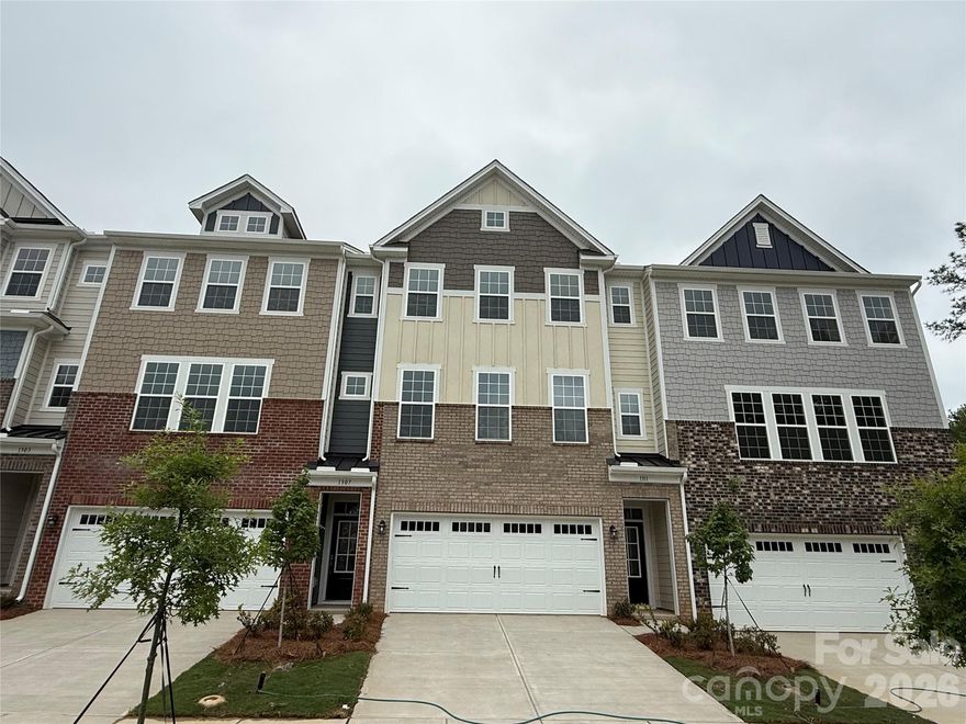 This new three-story townhome is optimized for gracious living. The lower level features a Bonus space with a full bathroom and two-car garage. Upstairs, an open-plan layout connects the kitchen, breakfast room and family room, with an attached deck for serene indoor-outdoor living. Ideally situated on the top floor are all three bedrooms to provide restful retreats, including the owner’s suite with a private full-sized bathroom. Plus, our signature Everything's Included program means you will get quartz or granite kitchen countertops, stainless steel appliances, luxury vinyl plank flooring, and so much more at no extra cost! Close to downtown Waxhaw, local shops, restaurants, retail and grocery stores. Just a short drive away are Uptown Charlotte and the Promenade at Carolina Reserve shopping center.