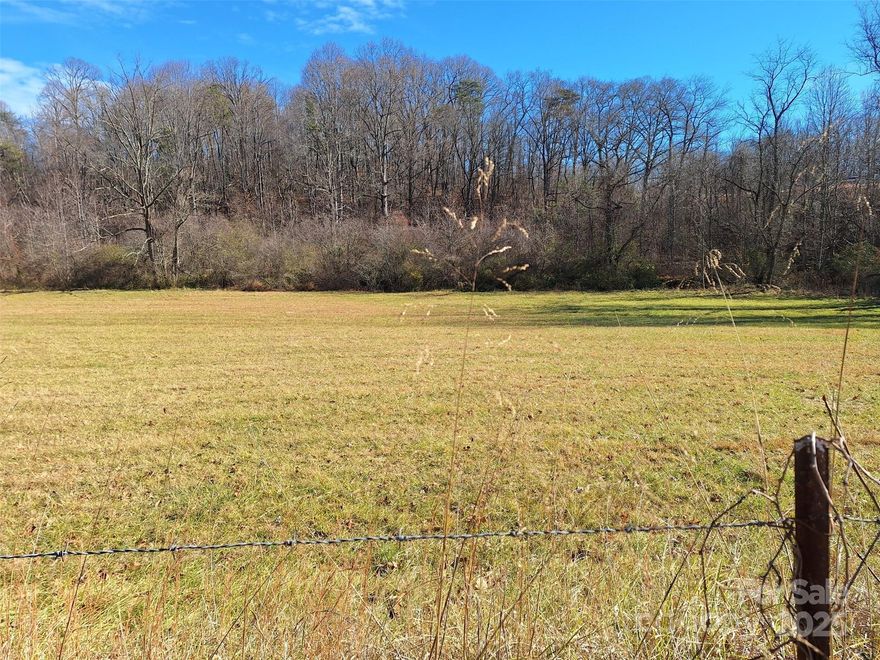Unique opportunity to own 11.32 acres in the heart of Western North Carolina. Build your dream home, Family compound or awesome Investor opportunity! Easy close access to I-40 off of Exit 37.  There are many possible uses due to open use zoning! Property is located close to a Dollar General store, Gas stations and a Truck Stop.  This property has is being sold with 5 separate parcels totally 11.32 acres and there are 2 homes being sold as-is.

Parcel #1: 8687-43-1702-00000 is .46 acres with a brick home being sold as-is
Parcel #2: 8687-43-3833-00000 is 2.23 acres is Land only and is the field in front of the brick home.
Parcel #3: 8687-44-3148-00000 is 1.16 acres is Land only.
Parcel #4: 8687-43-0978-00000 is 1.32 acres and with a green house being sold as-is.
Parcel #5: 8687-43-8874-00000 is 6.55 acres and is currently being split into 2 separate parcels and this one will change to 6.15 acres.