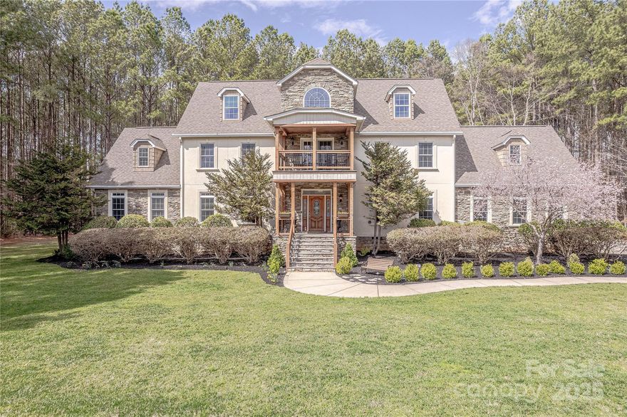 Situated on a remarkable 2 acre lot in desirable McKee Point, this former model home w/ outdoor oasis has been beautifully updated & is move-in ready. A rocking chair front porch w/ balcony leads to the open foyer. A natural light filled open concept floor plan is highlighted by grand 2-story great room w/ stacked stone gas fireplace. The chef’s kitchen features ample cabinets, chef’s island w/ cooktop, granite counters & tile backsplash. Large primary-on-the-main suite is finished with spa-like bathroom including double vanity, garden tub, glass enclosed tile shower & walk-in closet. Venturing upstairs the three guest suites are complimented by an open loft & flexible study room.  Don’t miss the third floor which is highlighted by another guest suite plus an open & flexible bonus room. Relax on the screened in porch which overlooks the fenced pool area offering limitless space for entertaining. Conveniently located, yet offering privacy & seclusion, this is one you don’t want to miss!