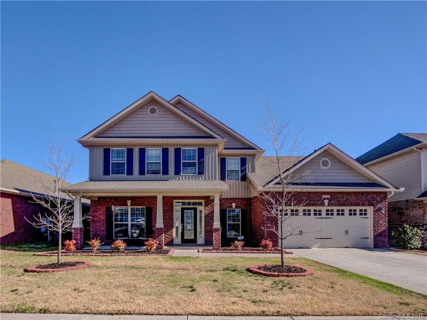 Spectacular 2 story home w/outside brick finished-1st floor. Featuring 5 bedrooms and 3.5 baths w/Master on main. Walk-in closets throughout home. Large Laundry/Utility Rm, Formal Dining can be converted into an Office/Study Rm. Upstairs storage room. Hardwood floors in Dining, Foyer, Hall and Powder Room. Kitchen equipped w/SS appliances, Pantry, Granite counter tops & tile back splash. Finished two car garage. Close to restaurants, shopping centers, Carowinds Theme Park and lots of amenities.