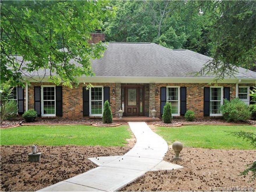 2.75 Acre estate home a few blocks away from Charlotte Latin School, minutes to Arboretum with all the updates and upgrades a buyer would want. 3 car attached garage is finished out completely with heat and cool air. 2 master suite option if needed. East wing master suite and bath has heated tile to enjoy. Anderson Windows for entire home were installed in Oct 2010. 30 Year Roof installed Dec 2008. ISE- instant hot water / Water Softner / Culligan Filter / Polished Porcelain. Wheel Chair Access