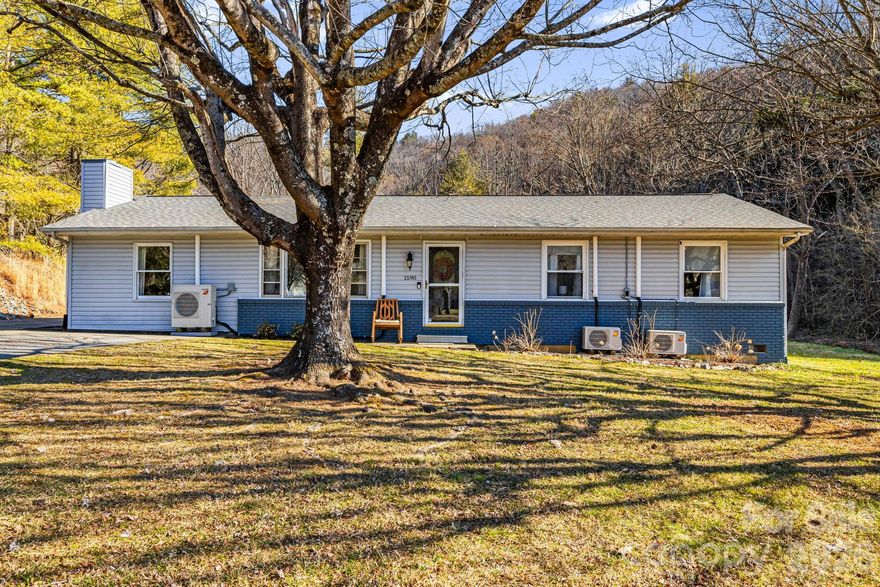 WELCOME HOME TO THIS BEAUTIFULLY UPDATED RANCH STYLE HOUSE LOCATED JUST OUTSIDE MARS HILL'S QUAINT DOWNTOWN. Set on a rare, flat 0.5-acre lot, 1590 Bruce offers easy single-level living. The expansive, level yard is perfect for outdoor entertaining, gardening, or simply soaking in the fresh mountain air. Since its last purchase, the home has undergone numerous updates, including major mechanical system upgrades (HVAC, hot water heater, and sump pump), the installation of French drains, and crawl space encapsulation with a commercial-grade dehumidifier, providing peace of mind for years to come. 

While classified as a 3-bedroom due to the septic, 1590 Bruce lives like a 5-bedroom home, offering exceptional flexibility for guests, home offices, or bonus spaces. Inside, you'll find two gorgeously updated bathrooms and a dreamy laundry/mud room to store everything you may want. Thoughtful updates throughout enhance both comfort and functionality, making this property truly move-in ready.
