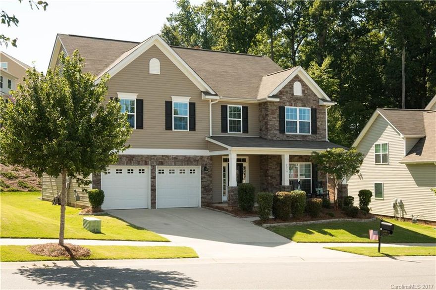 Beautiful Belmont home with an amazing outdoor bar, grill and covered patio.  The interior is filled with tasteful upgrades including hardwood floors, granite, staggered cabinets, and stainless appliances.  Large bedrooms, bathrooms and closets.  Master bath with dual sinks, separate tub and large tile shower.  Custom cabinets in the walk-in laundry room.  Very desirable community with pool, playground, and clubhouse.  New Harris Teeter just a half mile down the road. Don't miss this one!