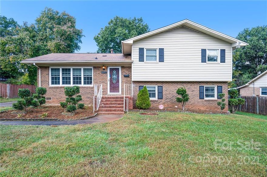 This Charlotte two-story home offers granite countertops.