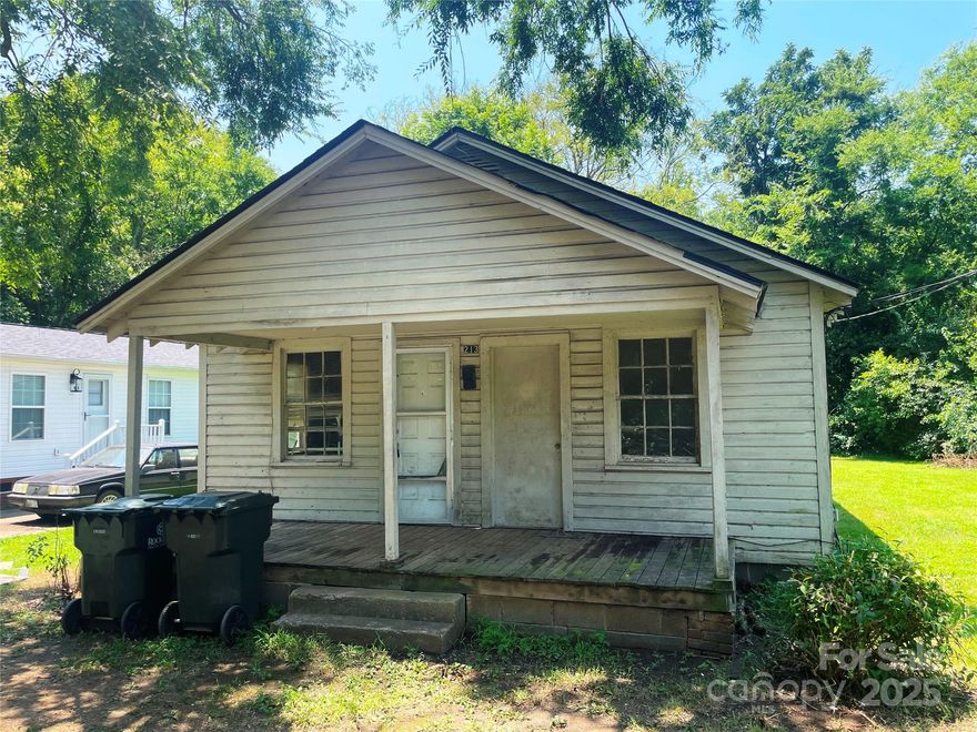 Previously a duplex converted to a single home. Good investment property. Will need some work. New roof in 2024. Electric service has been upgraded. Most of the windows have been replaced. Two gas heaters will be included with the sale. Use caution – floor is weak in the laundry area.