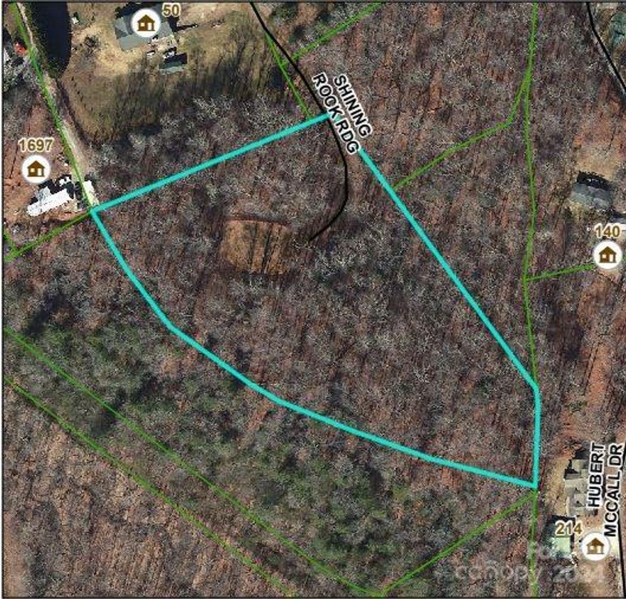 Embrace the tranquility of nature with this exceptional opportunity to own 3 acres of unrestricted land in the picturesque community of Balsam Grove, NC. Nestled in the foothills of the Blue Ridge Mountains, this parcel offers an idyllic setting for your dream retreat or investment venture. Just a stone's throw away from the renowned Blue Ridge Parkway, this property boasts convenience and natural beauty in equal measure. Nice level spot for future development and a driveway already established. Schedule a showing today!
