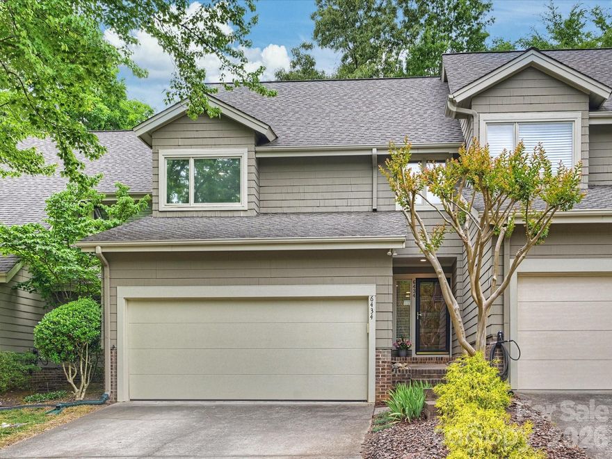 Welcome home to this move-in ready townhome in sought after Sharon View Place. This is one of the few townhomes in the community offering three bedrooms and a two-car attached garage. The living room features custom built-in cabinetry, a stone fireplace, large french style doors, vaulted ceiling and skylights, filling the space with abundant natural light. The living room and breakfast area both open to the back deck, creating an easy indoor-outdoor flow ideal for relaxing or entertaining. The bright kitchen offers stainless steel appliances, ample cabinetry and countertop space, providing excellent storage and functionality. Upstairs are three bedrooms, including the spacious primary bedroom with two large closets. This home also features a long list of thoughtful upgrades including LVP flooring added upstairs, newer carpet on stairs and living room, rocker dimmer switches added throughout the home and bulbless LED recessed lighting added to both levels. The garage contains both freestanding and ceiling industrial storage racks, maximizing organization and usable space. The HVAC and water heater were replaced in 2021. Ideally located just minutes from SouthPark and the Arboretum, and within walking distance to Olde Providence Racquet Club, this home offers exceptional convenience in a highly desirable location.