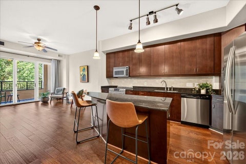Photo of 4625 Piedmont Row Drive #316, Charlotte, NC 28210 (MLS # 4400741)