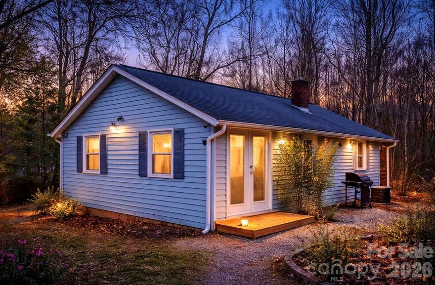 MOTIVATED SELLERS! Charming 2-bedroom, 1 bath home set on a flat, usable lot just minutes from the heart of Asheville. Less than 10 minutes to downtown and under 7 minutes to all the restaurants, shops, and energy of West Asheville, this property offers the rare combination of convenience and breathing room. Sellers added brand new baseboards throughout after photos were taken!

The setting feels quiet and tucked away, yet you’re never far from everything that makes this area so special. The level yard is a standout feature and offers true usability for gardening, outdoor living, or small homesteading touches. The current owner has enjoyed keeping chickens, with an existing chicken coop and run already in place, along with established fruit trees and bushes throughout the yard.

Inside, the home feels efficient and functional, with natural light filling the living spaces. The layout flows easily, with the bedrooms comfortably separated and well suited for everyday living. It works equally well as a primary residence, a second home, or an investment opportunity.

The sellers have brand new water heater and hardware that will convey with property.