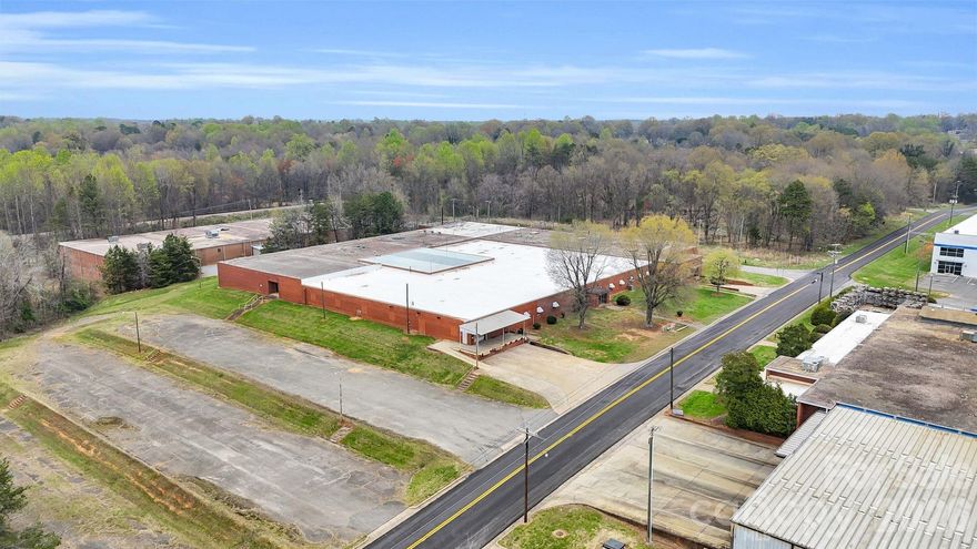 Reduced!!! Motivated Seller---Over 75,000 square feet on nearly 10 acres ---Proximity to International Airport (33 miles) ---Parking for 125 vehicles ---Multiple Docking Bays ---2 Separate Office Entrances ---4 Large Bathrooms ---Roof has been almost completely replaced. Blank canvas waiting for custom design to suit your needs. Plenty of space for storage or future growth.
Industrial Space for Manufacturing/Warehouse/Office with plenty of water, heavy electric. Approximately 1 mile from Hwy 150, Hwy 274, and Hwy 279. Easy access to Hwy 321 (10 miles), Interstate 85 (16 miles) and Interstate 40 (30 miles). Convenient to Multiple Regional Airports and 33 miles to Charlotte Douglas International Airport. Attached property is also available for sale from a different seller and brokerage. Inquire for details if multiple buildings/acreage are needed. 
Could be used as one unit or broken up into multiple leasable warehouses. Could be used by a company that may have multiple divisions that could operate under one roof with separate office space.