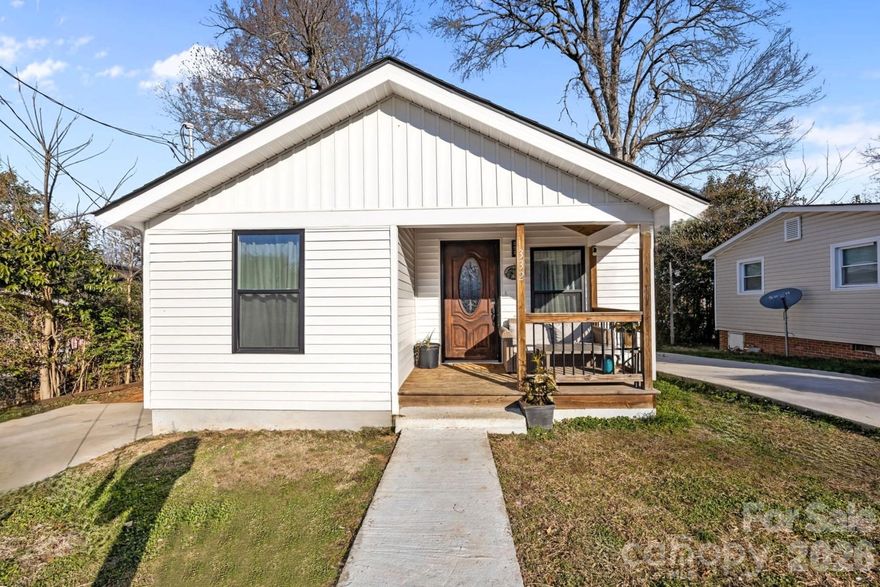 Welcome home to this beautifully remodeled 3-bedroom, 2-bath ranch with NO HOA! Relax on the inviting front porch or entertain guests on the spacious back deck overlooking a flat, usable backyard. Step inside to an open-concept living and dining area that flows seamlessly into a modern kitchen featuring butcher block countertops, new cabinetry, and stainless steel appliances. The desirable split-bedroom floor plan offers added privacy. The primary suite includes an en-suite bath and great natural light with views of the backyard. Secondary bedrooms are generously sized and share a full bath. Enjoy low-maintenance laminate flooring and recessed lighting throughout. Lots of parking space with double driveways. Major updates completed approximately three years ago include: roof, HVAC, water heater, flooring, plumbing, electrical, and fixtures — providing peace of mind for years to come. Located in a growing area surrounded by new construction and beautifully remodeled homes. Conveniently situated in the heart of Lancaster, just minutes from Downtown Lancaster, Charlotte, and Indian Land. Close to Hwy 521, Independence Park Trail access, schools, Wylie Street Pool, and the Lancaster County Library.

Don’t miss this move-in-ready gem in an up-and-coming location!