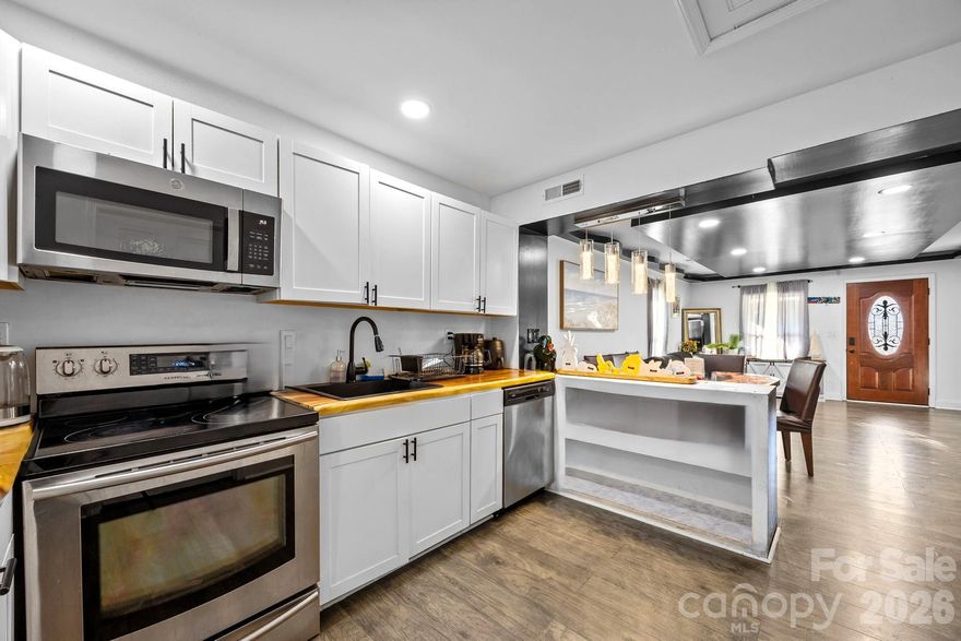 Welcome home to this beautifully remodeled 3-bedroom, 2-bath ranch with NO HOA! Relax on the inviting front porch or entertain guests on the spacious back deck overlooking a flat, usable backyard. Step inside to an open-concept living and dining area that flows seamlessly into a modern kitchen featuring butcher block countertops, new cabinetry, and stainless steel appliances. The desirable split-bedroom floor plan offers added privacy. The primary suite includes an en-suite bath and great natural light with views of the backyard. Secondary bedrooms are generously sized and share a full bath. Enjoy low-maintenance laminate flooring and recessed lighting throughout. Lots of parking space with double driveways. Major updates completed approximately three years ago include: roof, HVAC, water heater, flooring, plumbing, electrical, and fixtures — providing peace of mind for years to come. Located in a growing area surrounded by new construction and beautifully remodeled homes. Conveniently situated in the heart of Lancaster, just minutes from Downtown Lancaster, Charlotte, and Indian Land. Close to Hwy 521, Independence Park Trail access, schools, Wylie Street Pool, and the Lancaster County Library.

Don’t miss this move-in-ready gem in an up-and-coming location!