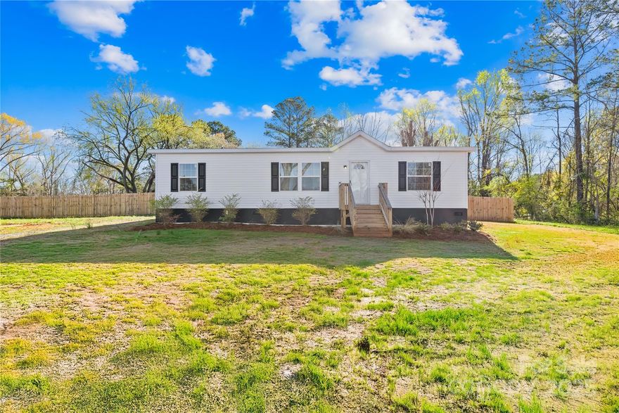 NEW PRICE!! Practically new and ready for you! This 2023-built Clayton Legend home offers 3 bedrooms, 2 baths, and sits on 1.23 acres with a fully fenced in back yard  in Fort Lawn, SC. Enjoy the perfect blend of modern comfort and privacy, all while being just minutes from Gallo Winery and the new Whitewater park. With an open-concept layout, stylish finishes, and a spacious lot, this home provides the ideal balance of peaceful living and convenient access to shopping and recreation. Seize  this opportunity—schedule your showing today!