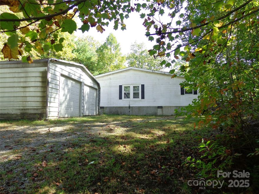 Triple Wide with winter views and privacy. Extra nice large kitchen with Island  and area for small table. Large laundry room. New skylights, new hall bathroom with walk in shower, new Trane heat pump and new windows.
Nice mountain property with double detached garage/workshop.4 bedrooms with 3 bedroom septic permit. Owner can't make any repairs and will also be present at showings.  This is a good size house which needs some TLC -