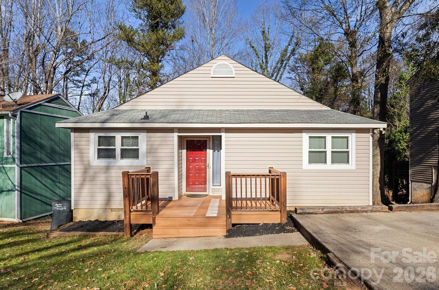Welcome to this CHARMING cottage-style RETREAT nestled in the heart of the highly desirable lake community of Tega Cay. This 2-bedroom, 1-bath home also features a BONUS BUNK ROOM (not included in the heated living area), making it a flexible space for guests, hobbies, or weekend getaways.

Surrounded by mature woods, the home offers a PEACEFUL, TREEHOUSE LIKE feel—especially when relaxing on the back deck, where privacy and nature take center stage. Inside, the home is COZY and FUNCTIONAL, and the washer and dryer convey for added convenience. Previously used as a rental for several years, this property presents an excellent opportunity for an investment, second home, or primary residence.

Enjoy all that Tega Cay’s lake lifestyle has to offer, including access to Lake Wylie, walking and biking trails, pickleball courts, a golf course, and community amenities. Spend summer evenings at concerts at Runde Park, or take advantage of the many outdoor recreation options that make Tega Cay such a special place to live.

A RARE opportunity to own an affordable slice of lake-community living—don’t miss it!
