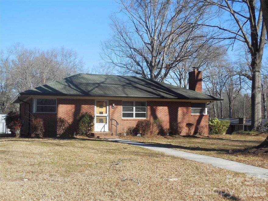One owner beautiful brick ranch located on large .5 acre corner lot has been lovingly owned throughout the years.  GREAT location.  Move-in condition.  Beautiful hardwood floors. Screen porch to enjoy with family and friends.  Additional storage building to remain.  Three bedrooms & 1&1/2 baths with plenty of land to expand square footage of home if desired.
