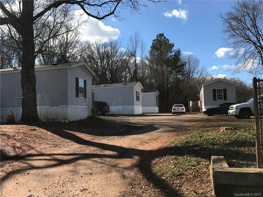 Great investment opportunity! Nice mobile home park located minutes from shopping, dining, & I-77. Includes four 2015 single wide mobile homes. Good stable rentals bringing in $700/month each with minimal owner expenses. Owner financing possible with 20% down.