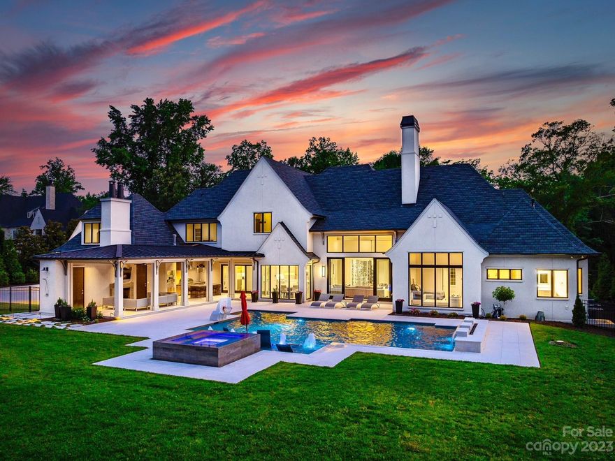 One of a kind, modern, Kingswood Home built in 2019. This exquisite home shows like a model home. Situated on 2-acres and with 7,491 square feet. The custom designed curved stairwell, by Artisan, and chandelier are breath taking. The main level and upper level feature a Walker Zanger light gray stone tile. The full glass refrigerated wined display room is like a work of art. Main level primary bedroom with custom designed, oversized closet and luxurious primary bathroom with heated floors and floating vanities. Main level features guest bedroom with ensuite and an office. The modern kitchen with double island and rift whit oak cabinetry, gourmet appliances, scullery room, all overlooking the gorgeous backyard and covered pavilion. Full wall of sliders, open up to the grilling pavilion with half bathroom and outdoor shower. Upper level features 3 guest bedrooms with ensuite, theater room, gym room and bonus room. Oversized pool and hot tub, with waterfall and fire wall. Impeccable home!