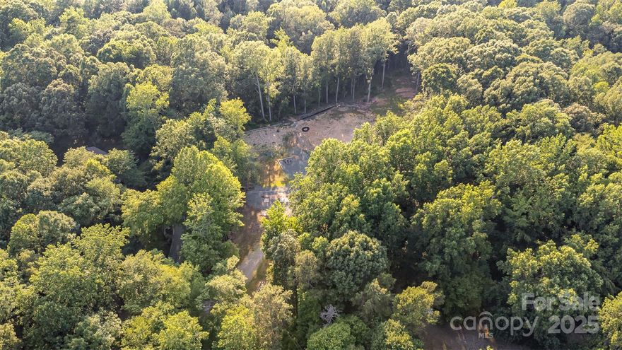 Build your dream home in Valley Farm...a secluded equestrian community with NO HOA. Incredibly private property is just 3 miles from downtown Waxhaw with all of its local shops, restaurants & parks. Current property has been cleared and has had septic installed good for a 5 bedroom property. Private well has also been installed and is pumping 25 gallons per minute! Valley Farms is a beautiful equestrian community with stunning horse farms, wooded views and a great location. The property has been prepped and is awaiting your custom dream home! The land has been surveyed with updated and recorded boundaries showing ownership into Bates Creek located along the Mineral Springs Greenway which has walking and riding trails. This is a rare opportunity to own a beautiful estate close to downtown Waxhaw.