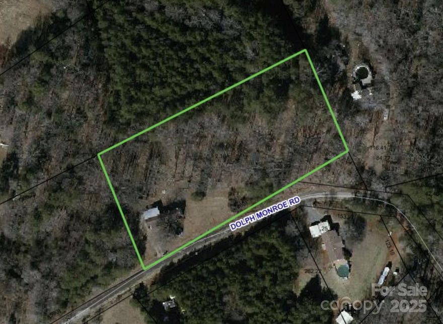 Nestled on over 2 acres of peaceful, wooded land in a private area surrounded by other larger lots, making this an excellent location for your next home.  Currently, a singlewide is located on the lot.Low Catawba County taxes and prime location make this property even more desirable. Don't miss this excellent opportunity!