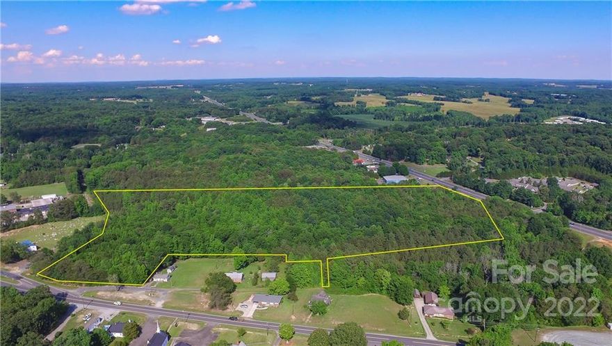 OPPORTUNITY ZONE in Ramseur for potential development. Excellent investment opportunity. 22.55 acres with road frontage on US 64 (Jordan Road) and frontage on Hwy 49. Land is partially cleared, partially wooded. House and other buildings on property at no value. Road frontage on US HWY 64 side is approximately 982 foot and NC 49 Hwy is approximately 400 feet.