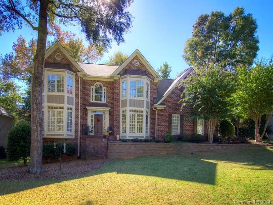 Beautiful finished basement home on a private, wooded lot in The Hamptons. Large bedrooms and lots of storage! Many system updates throughout home -- HVAC, water heater, and carpet all replaced within past three years. Main floor office with French doors. Large open kitchen and huge pantry. Breakfast Room features built-in bench.  Finished basement - rec room, bonus room, full bath and more. Vaulted screened porch & deck are perfect for outdoor entertaining.