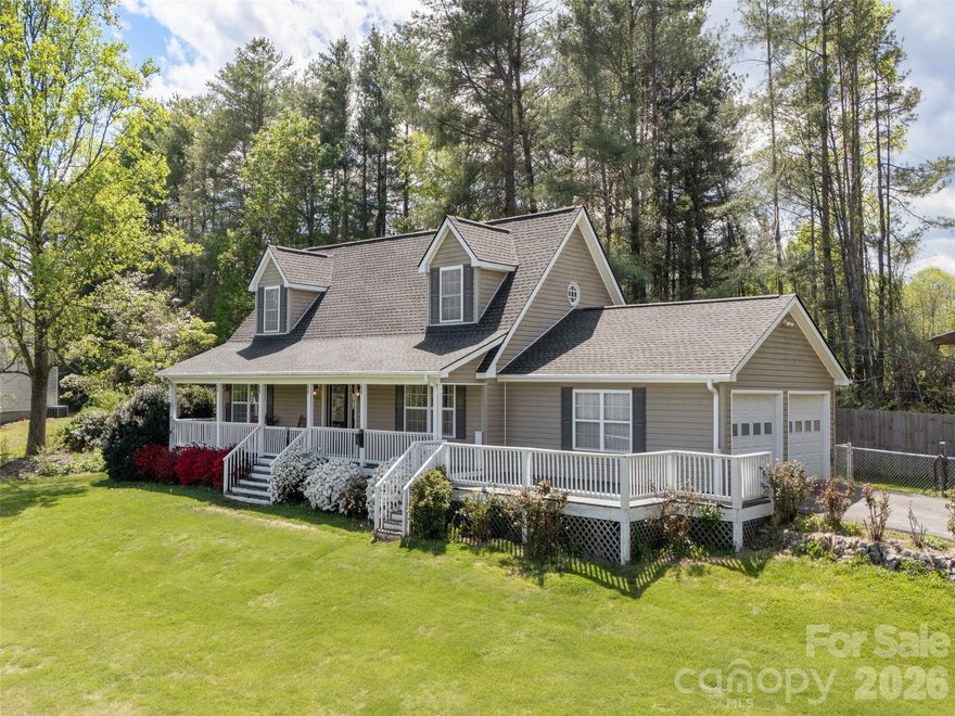 Welcome home to this inviting three-bedroom property featuring a classic rocking chair front porch. This is the perfect spot to enjoy the beautiful sunrise view! Step inside to find three full baths, a modern kitchen with an island and open dining area that is ideal for relaxed living and entertaining. The living room is highlighted by a gas log fireplace and the primary suite on the main level is complete with a separate step-in shower. A second bedroom is also conveniently located on the main floor, while upstairs offers a spacious family room and a beautiful bedroom suite. Enjoy outdoor living with a large yard, ideal for gardening or play, plus a fenced area for pets' safety. Additional amenities include a two-car attached garage, a storage shed, central heat and air for year-round comfort, and just minutes from shopping, recreation and Historic Main Street!