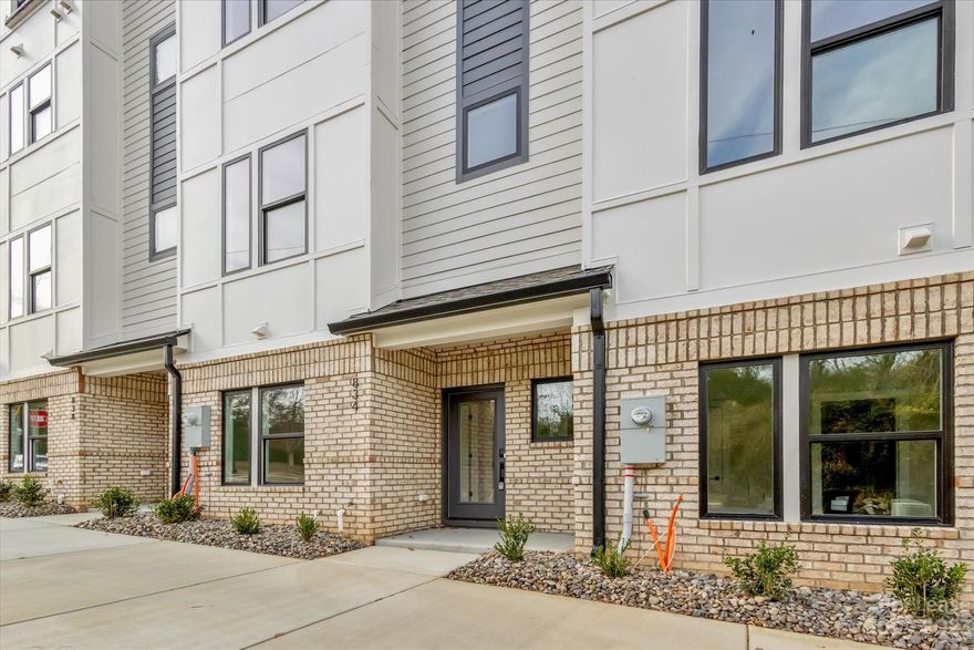 Discover the epitome of urban living in this brand-new townhouse for rent just outside uptown Charlotte. Boasting three bedrooms, three and a half baths, modern finishes, hardwood floors, and quartz countertops, this residence offers both luxury and convenience. With easy access to interstates and the airport, a spacious two-car garage, and breathtaking views of the city skyline, it's the perfect blend of comfort and sophistication. Welcome to your new home in the heart of Charlotte's vibrant lifestyle.