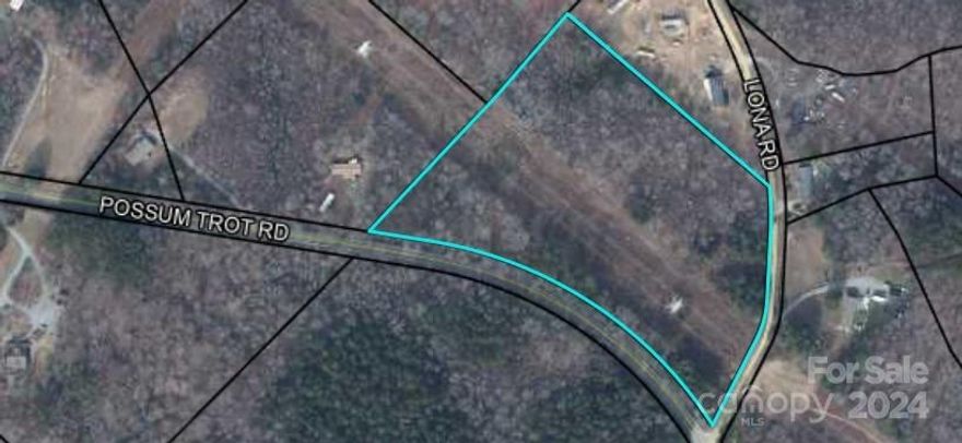 Escape to your own slice of tranquility with this beautiful 10-acre parcel in the heart of the countryside! This relatively flat, partially cleared land offers the perfect canvas for your dream home, farm, or weekend getaway. With ample space for outdoor activities and future development, you can enjoy the serenity of rural living while still being within reach of nearby amenities.

A utility easement runs through part of the property, providing convenient access to essential services. Whether you envision a private retreat surrounded by nature or an opportunity for agricultural pursuits, this versatile land has it all.

Don't miss your chance to create your ideal lifestyle in this peaceful setting. Schedule a viewing today and explore the endless possibilities!

Property is located on the corner of Lona Rd and Possom Trot.