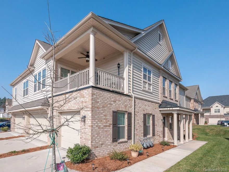 High-end upgrades throughout this impressive Ballantyne home!  Incredible open concept w/vaulted ceilings & hardwoods throughout the main living area.  The chef's kitchen includes 42" dark wood cabinets, granite, stainless & a glass tile backsplash.  Stylish baths w/popular dark wood cabinets & beautiful tile!  Unwind in the large master w/trey ceiling, window niche, large walk-in closet & the spa-like feel to master bath.  Spacious covered porch balcony w/textured flooring ideal for relaxing!