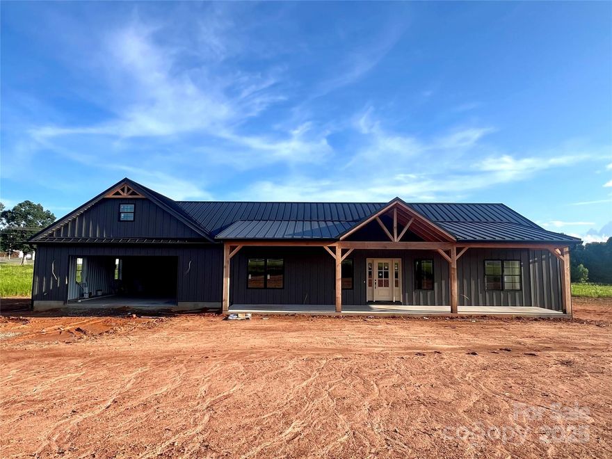 NEW HOME~ 1.2 ACRES 3BR 2BA and approx. 2034 sq. feet! Features include MOUNTAIN & SUNSET VIEWS, and a beautifully crafted design with 9ft ceilings, vaulted ceilings, and extensive upgrades like a TGI floor joist system and Zip System sheathing. The exterior boasts board and batten siding, standing seam metal roofing, 40X10 rear deck,  Fir Wood Post & Beam 48X8 front porch (overlooks Mtns), perfect for enjoying the scenery. Inside, luxury touches include solid wood cabinetry with quartz countertops, a large gas log FP, LVP flooring, and a spacious primary suite & bath w/ a walk-in shower and freestanding tub. The home is well-equipped with energy-efficient windows, an insulated 36X28 garage with attic storage, modern appliances w/ custom range hood, Pantry, farm sink, custom finishes in the bathrooms and kitchen, and thoughtful details like recessed lighting, ceiling fans, and a termite bait system! UPDATED PICS ADDED AS CONSTRUCTION IS BEING DONE!! June 30th Estimated Completion:)