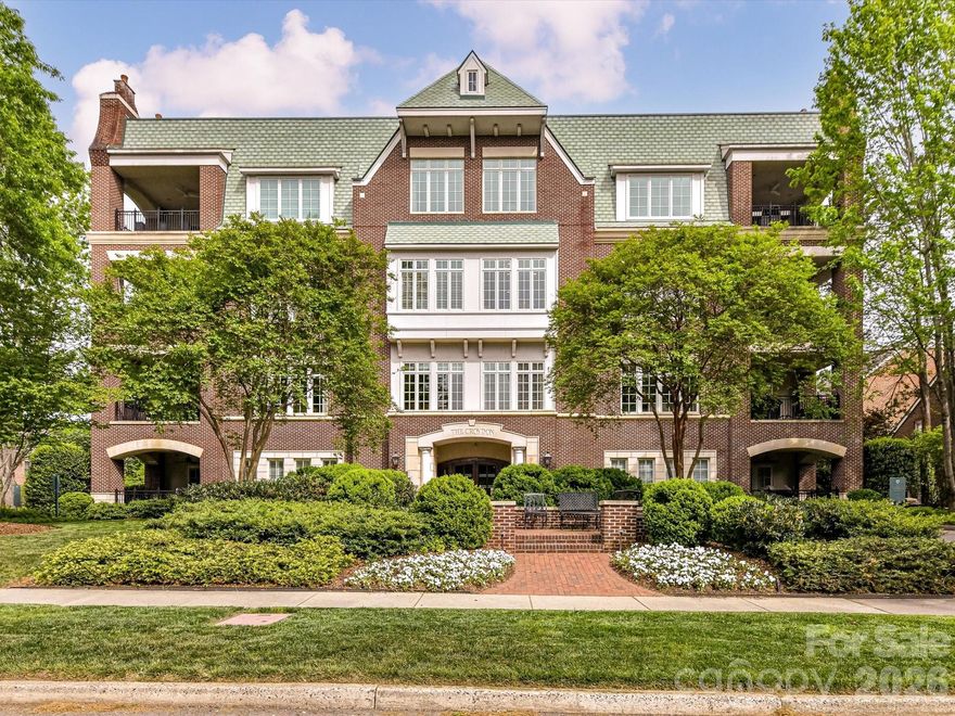 Experience luxury living in Myers Park with this beautifully appointed 3 bed/3.5 bath condo at The Croydon. Gracious foyer opens to spacious living room with coffered ceilings and separate formal dining room with tray ceiling, all with wood-flooring. The living room has a fireplace, a wall of windows allowing lots of light and lovely french doors leading to a covered porch with gas grill. The original kitchen plan was enlarged and features distressed ceiling beams, a cozy breakfast area overlooking the mature trees, upgraded cabinetry with granite counters, built-in work station and a built-in bar with sink and ice maker. There are full-sized, separate refrigerator and freezer, built-in microwave, trash compactor, pantry cabinets, and Thermador gas cooktop. The large center island has a butcher-block countertop, warming drawer and great storage. The primary suite has french doors to a private porch, built-in drawers/cabinets/bookcases and 5 closets, one of which is a large walk-in. Primary bath has soaking tub, over-sized glass shower and water closet with bidet. There are two additional guest suites, each with ensuite baths and walk-in closets, and one has access to the covered porch. Full laundry room with sink, wall cabinets, built-in ironing board and separate storage closet. Powder bath off foyer. Two assigned parking spaces and assigned storage closet in garage with 3 walls of shelving units. 
Lots of storage throughout! Ample guest parking on adjacent side-street and walkable neighborhood within a short distance to great dining and shopping.