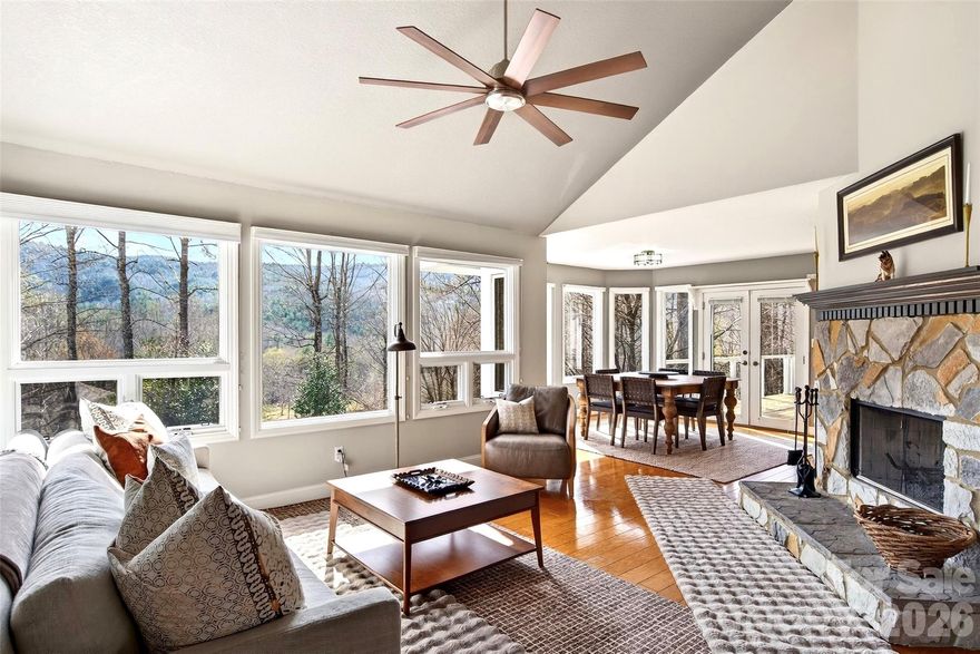 Tucked into the peaceful Blue Ridge Mountains, this light-filled architectural retreat offers the perfect blend of privacy, natural beauty, and modern mountain comfort. Designed to capture the surrounding landscape, the home features soaring vaulted ceilings, walls of windows, and multiple expansive decks that create seamless indoor-outdoor living, ideal for both relaxing and entertaining.
The open floor plan centers around a stunning natural stone fireplace and a bright dining bump-out that showcases tranquil wooded and mountain views, including beautiful Linville Mountain. Natural light fills the home, creating a warm and inviting atmosphere throughout.
This 3bedroom, 2.5 bath home offers a thoughtfully designed layout, highlighted by a private upper level primary suite that serves as a true retreat. Complete with its own gas fireplace, spacious reading nook, TWO walk-in closets, and private deck access, it’s the perfect place to unwind. The ensuite bath enhances the retreat like feel with a whirlpool tub and cedar sauna, creating your own personal oasis.
Additional bedrooms provide flexibility for guests, full time living, or potential vacation rental use. Unique features like the sauna and multiple outdoor living spaces further elevate the home’s mountain retreat appeal.
Overlooking a scenic disc golf course, the property offers a fun and unique backdrop whether you enjoy playing or simply taking in the outdoor setting.
Recent updates include fresh interior paint, updated carpet, a newly replaced upstairs heat pump, fresh exterior paint, and a newer roof, giving peace of mind that key improvements have already been taken care of.
Ideally located just minutes from the Blue Ridge Parkway, Linville Caverns, Linville Falls, and Linville Gorge hiking access, this home provides exceptional proximity to some of Western North Carolina’s most sought after outdoor destinations.
Whether you’re searching for a full-time residence, second home, or income producing mountain getaway, this move in ready property presents a rare opportunity to enjoy the very best of Blue Ridge mountain living.