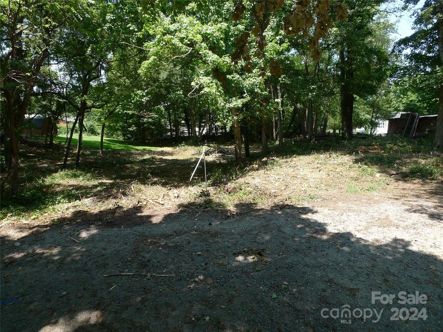 Less than 5 blocks from downtown Mocksville, this property is convenient to shopping and dining. City water and sewer are available. No manufactured homes allowed per zoning. Address not officially assigned; only used for reference purposes.