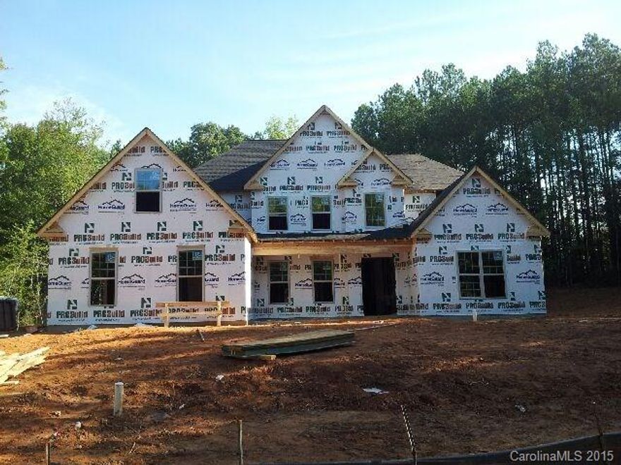 Must see! Remarkable 5 Bdm, 3.5 bath w/covered front &  back porch. Owner’s suite, main floor, w/a sitting area, distinctive trey ceilings, walk-In closet, bath w/garden tub & separate shower & dual vanities. Vaulted ceilings in LR,coffered ceilings in DR, 2-story foyer & family room makes a bold statement in this home. Large FR has a cozy fireplace & opens to a kitchen w/spacious brkfast area & island style brkfast bar, catwalk overlooks FR & foyer, vaulted or trey ceilings in large 2nd bdrms.