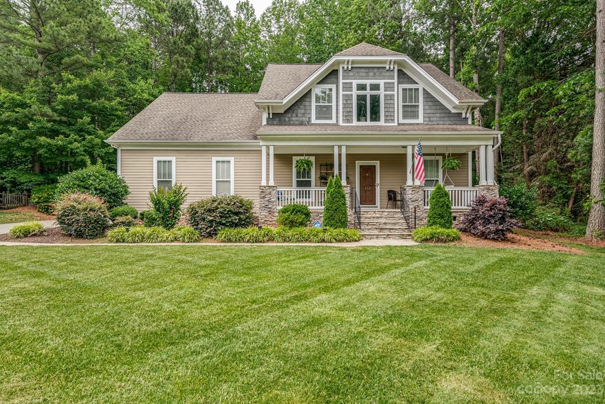 True Arts and Crafts home, known for functional floor plans, practical designs, decor & style. Large Covered Front Porch with Stone accents. Front foyer and hallway to Formal Office and French Doors. Formal Dining Room with Hardwood floors, opens to Kitchen-Great room. Granite Kitchen, Subway style tile backsplash, Tall Cabinets, Stainless Appliances, New Dishwasher with Interior light, This Kitchen has multiple work space counter tops, breakfast bar, niche for table and more beautiful Hardwood floors. Main level has finished real hardwood flooring.  Fireplace in Great room relax with views of the large deck and yard. Primary Bedroom on main New Carpet,  double trey ceiling and extensive millwork too. Updates in Bathroom and large walk in closet Upstairs has 3 bedrooms and  BIG Bonus room AKA 5th bedroom. Bonus had New Carpet and neutral new paint. Bedroom 2 and 3 w/ Jack & Jill bath, walk in closets too. Private mature tree lined back yard, huge deck for entertaining. Welcome home.