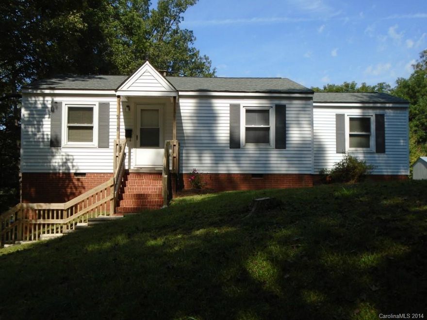 Nice home in great location with good schools. Lot next door belongs with this house and provides some privacy. New paint and vinyl inside. Very deep crawl space could be changed to accomodate addl storage.