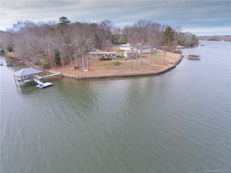 Imagine the Lake Life. Coffee on the porch taking in the quiet across the water. Afternoons spent boating and basking in the sun, and fishing in the deep water right off the dock. Moonlit bonfires as night rolls in. Imagine the fireworks in July and the barbeques in Spring along the 300 ft of waterfront with sea wall surrounded by friends and family playing games. With 3 bedrooms, 2 baths, and a cozy cabana too, you'll find the perfect place to rest your head before tomorrow's adventures begin.