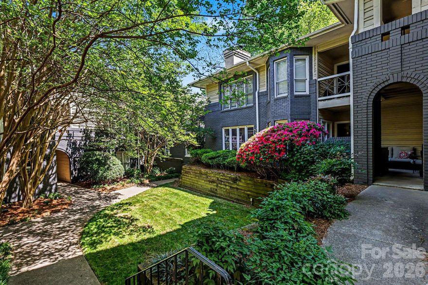 This adorable condo is nestled in the heart of Myers Park and is only minutes away from Uptown, two main hospitals, dining and shopping.   Boasting 2 bedrooms and 2 full baths, this end unit has all the charm and elegance
you would expect in such a beautiful part of our city.   Unwind on the covered patio after a long day or stroll the tree-lined streets to Theatre Charlotte or the Duke Mansion for a fun-filled evening.  Inside you will find gorgeous Travertine floors in the den and dining areas.   A cozy wood-burning fireplace will provide the perfect ambiance on those cold winter nights.  The kitchen and bathrooms feature quartz and granite countertops with stainless steel appliances to handle all of your cooking needs!   With the HVAC having just been replaced in October of 2025 this unit has been freshly painted and well-maintained making it move-in ready for the next owner.