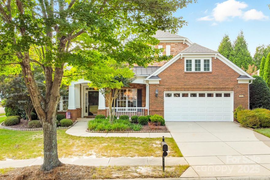 Welcome to this beautifully designed Morningside Lane home in the highly desirable Sun City Carolina Lakes community! This stunning residence offers nearly 3,000 square feet of thoughtfully crafted living space with an elegant partial brick exterior and a charming front porch. Inside, you’ll find gorgeous hardwood floors flowing through the main living areas, enhanced by natural light from solar tubes in the kitchen and great room. The gourmet kitchen is a true showstopper, featuring light grey cabinetry, stainless steel appliances, a gas cooktop with vent hood, a spacious center island, granite countertops, and a walk-in pantry for ample storage. The formal dining room with a tray ceiling and Butler’s pantry provides the perfect setting for entertaining, while the open great room boasts a cozy gas-log fireplace flanked by custom built-ins. Retreat to the luxurious primary suite, where tray ceilings add elegance and the spa-inspired bathroom offers dual vanities with quartz counters, a soaking tub, a frameless glass shower, and a custom walk-in closet. The versatile three-season room with vaulted ceilings and tile flooring invites relaxation year-round and opens to a private rear patio ideal for outdoor living. Additional highlights include a central vacuum connection, a two-car garage with an insulated overhead door, epoxy-coated flooring, and built-in shelving for organization. Perfectly combining comfort, style, and functionality, this home delivers an exceptional lifestyle in one of Fort Mill’s most sought-after active-adult communities.

Use preferred lender to buy this home and receive an incentive towards your closing costs!