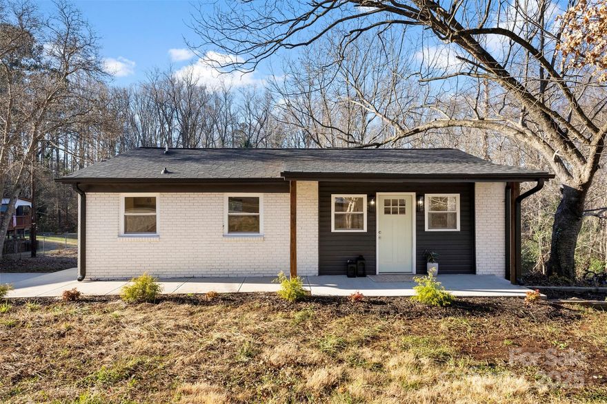 Welcome to 507 W Henry in Belmont, NC! This home has been completely renovated for its new homeowners; from roof, siding, windows, HVAC, electrical, plumbing and all interior aspects almost everything is new. This home has been carefully designed to maximize living space. Inside you will find a cozy living room on the main level with beautiful light vinyl plank floors, a kitchen with quartz counters, a dining area, master bedroom with stunning en suite, a second bedroom and full bath room.

Go downstairs and you will find a great flex space with exterior door to access the backyard, 2 more bedrooms, a full bathroom and your laundry space. This home is beautiful and it's ready for its new homeowners. Whether you are thinking to live here and enjoy the expansive backyard or turn it into a rental, the options are endless. Minutes from downtown Belmont, around the corner from Belmont Abbey University and the new Caramont Hospital this homes location is a dream.