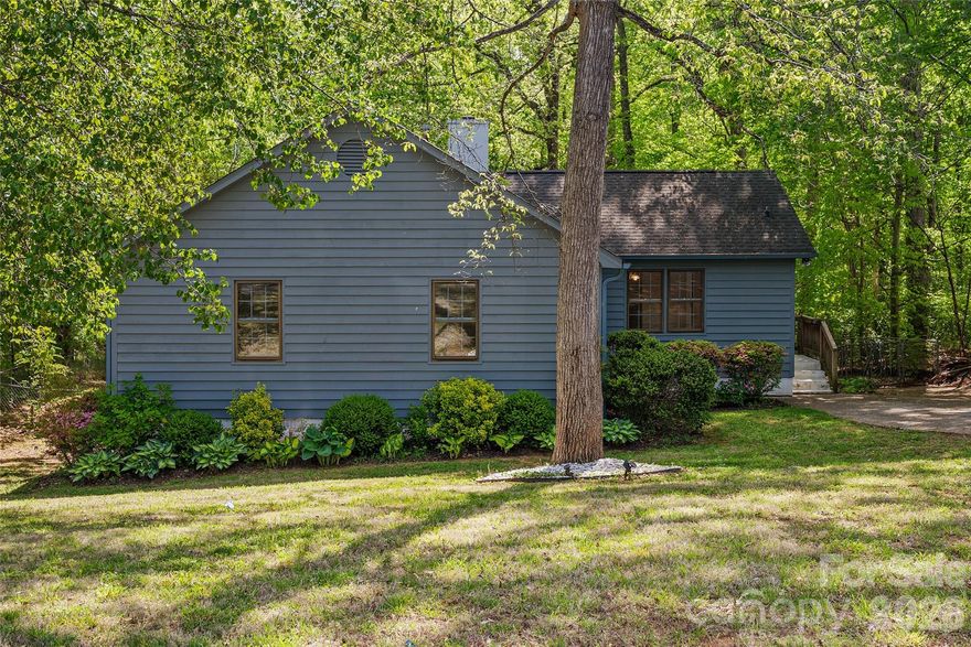 Tucked away on a beautifully private, tree-lined lot, this Charlotte gem offers the perfect blend of peaceful living and everyday convenience. Situated on approximately .72 acres, the property invites you to slow down, spread out, and truly enjoy your surroundings.
Step outside and you’ll find a backyard designed for both relaxation and function—complete with a fenced area for pets, open green space, and a backdrop of mature trees that create a serene, retreat-like setting. The spacious back deck is ideal for morning coffee, evening unwinding, or hosting friends under the Carolina sky.
Inside, the home welcomes you with a warm and inviting atmosphere. Cozy up by the wood-burning fireplace on cooler evenings and enjoy the comfort of thoughtfully updated interiors. Recent improvements including fresh interior and exterior paint, updated flooring, new doors, and gutter guards offer a move-in ready experience and added peace of mind.
Function meets practicality with ample storage options, including a generous laundry area, multiple closets, and additional space in both the attic and sealed crawl space.
Located just minutes from outdoor adventure at the U.S. National Whitewater Center, you’ll have easy access to Charlotte Douglas International Airport, while still enjoying the quiet feel of a tucked-away neighborhood. Plus, you’re a short trip from the energy, dining, and entertainment of Uptown Charlotte.
If you’ve been searching for a home that offers privacy, charm, and modern updates with unbeatable access to everything Charlotte has to offer, this is the one you don’t want to miss.