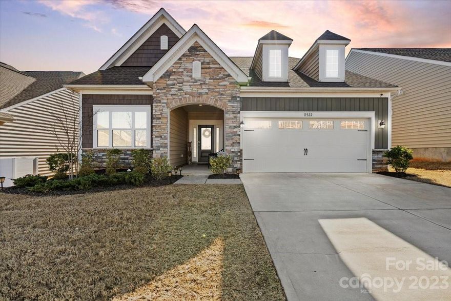 Inviting 1.5 Story Single Family Home adorned with vinyl siding and Stone Accents.  Boasting 3 spacious bedrooms and 3 Full Baths, with the Master Bedroom located on the main level.  This residence offers comfort, style and elegance.  The gourmet kitchen is a culinary haven, with granite countertops, kitchen island, eat in breakfast area, and formal dining room adds a touch of sophistication.  A walk in pantry provides convenience, and the bonus room offers versatile space for creative endeavors.  This home harmonized functionality with aesthetic appeal, creating an ideal haven for living and entertaining.  Enjoy the outdoors with a screen in back porch, stone patio and firepit.  Explore the seamless blend of modern design and classic charm in every corner.  Located in Southwest Charlotte, minutes from I-77, I-88, I-485, fine dining, Carowinds Theme Park, and Charlotte Premium Outlet Mall.
