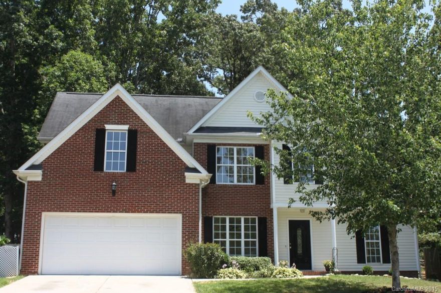 Wonderfully updated and ready for a new owner!  This lovely home has laminate wood floors in all rooms except tile in kitchen & baths, and carpet in bonus room (which could also be used as a 4th bedroom). Master suite on main level, with large walk-in closet. All bedrooms have large closets. Garage is finished off very nicely.  Backyard is an oasis to enjoy after a long day of work. Fenced yard backs up to field. Neighborhood has park with playground, walking trails. Home warranty.