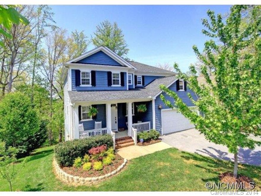 Imagine cooking in this fully equipped kitchen with 42" cherry cabinets with granite counters.  Easy living inside with hardwood floors throughout main level. After you enjoy taking your family on the miles of trails, playgrounds, swimming, boating, a game of tennis, or camping on the lake return home to refreshing beverage on the back deck or covered front porch on private cul-de-sac.  You can't find this home or lifestyle for this price!